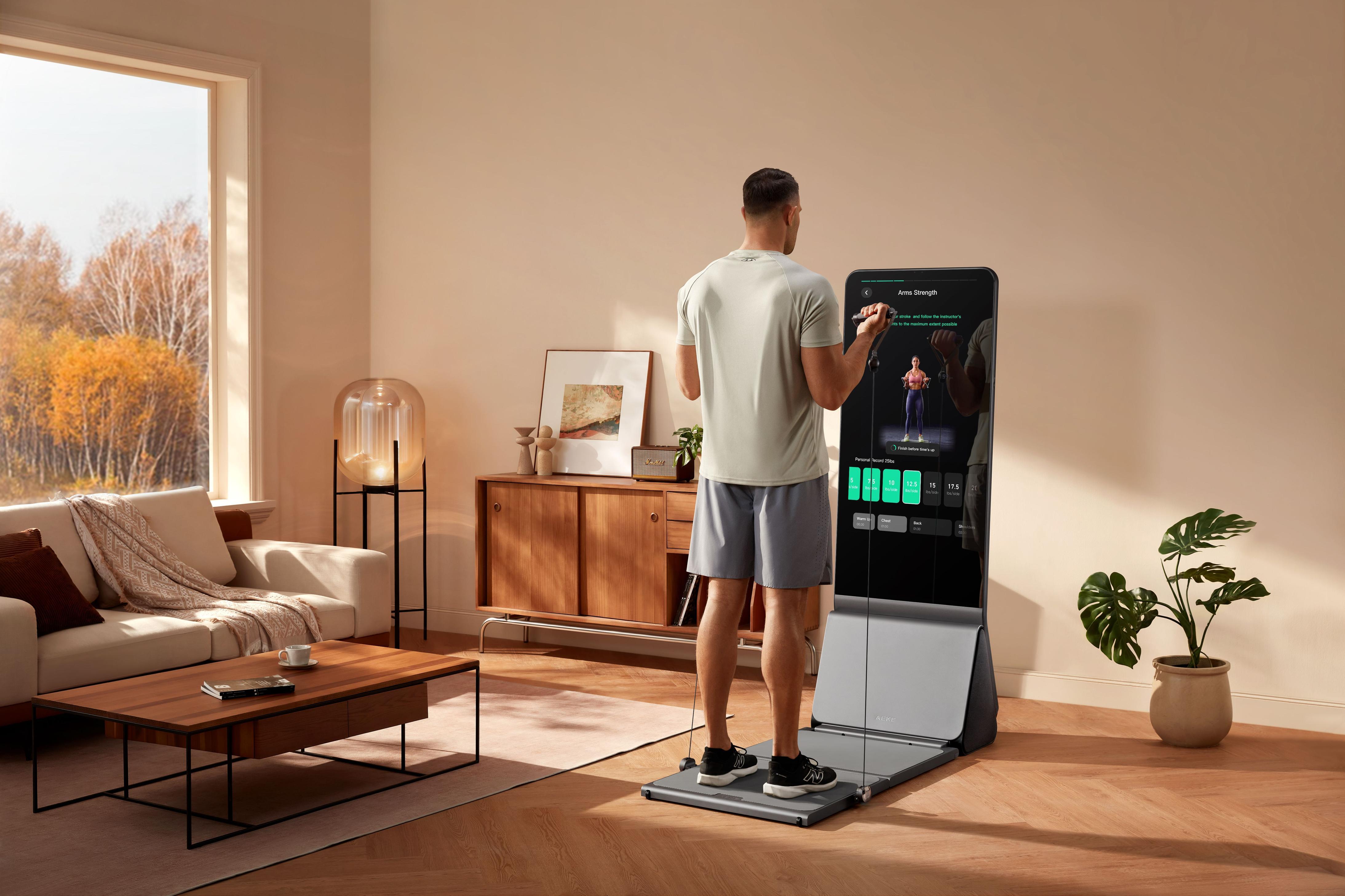 Man using AEKE smart fitness mirror for arms strength training at home