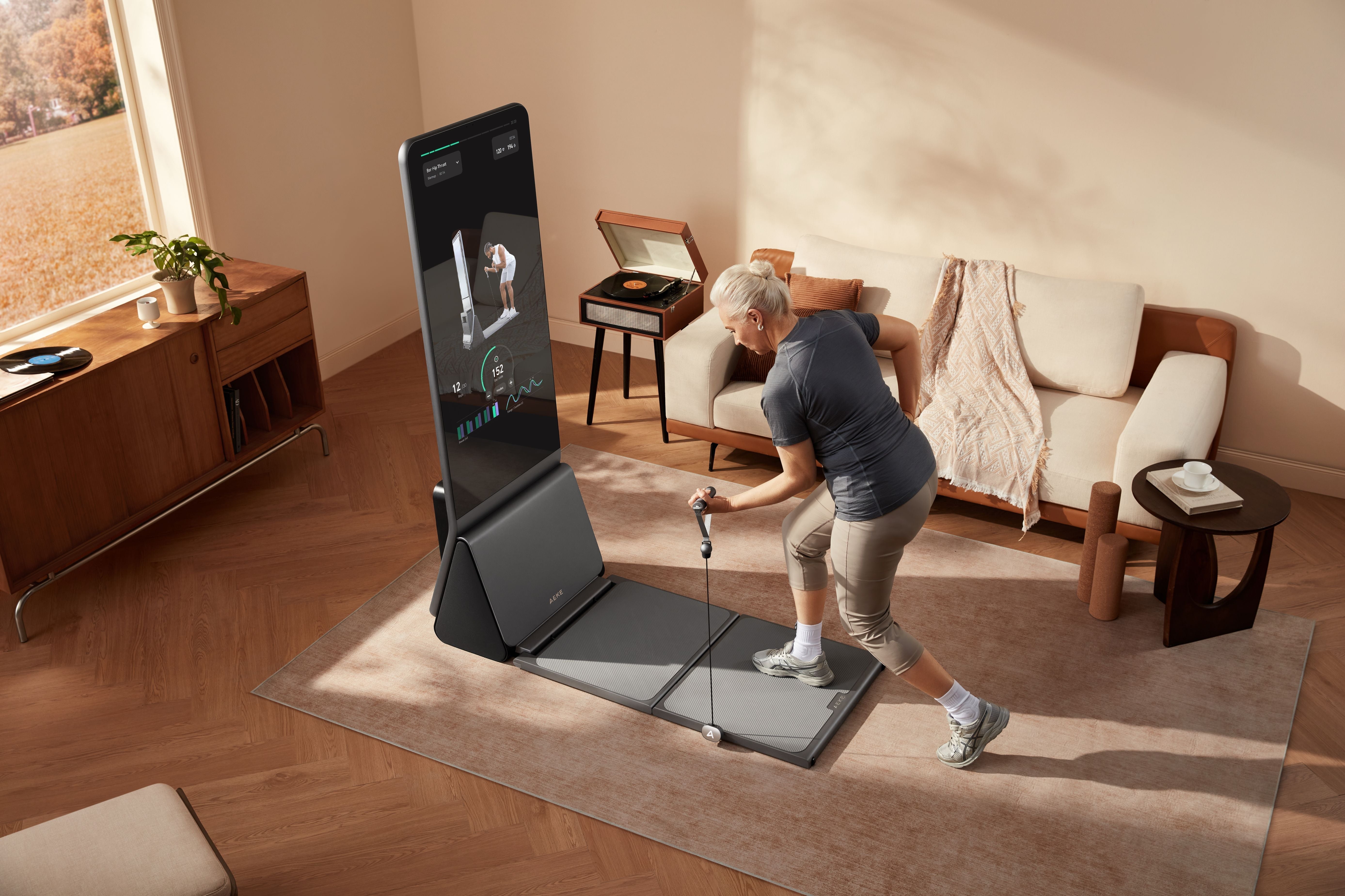 woman using smart home gym in living room