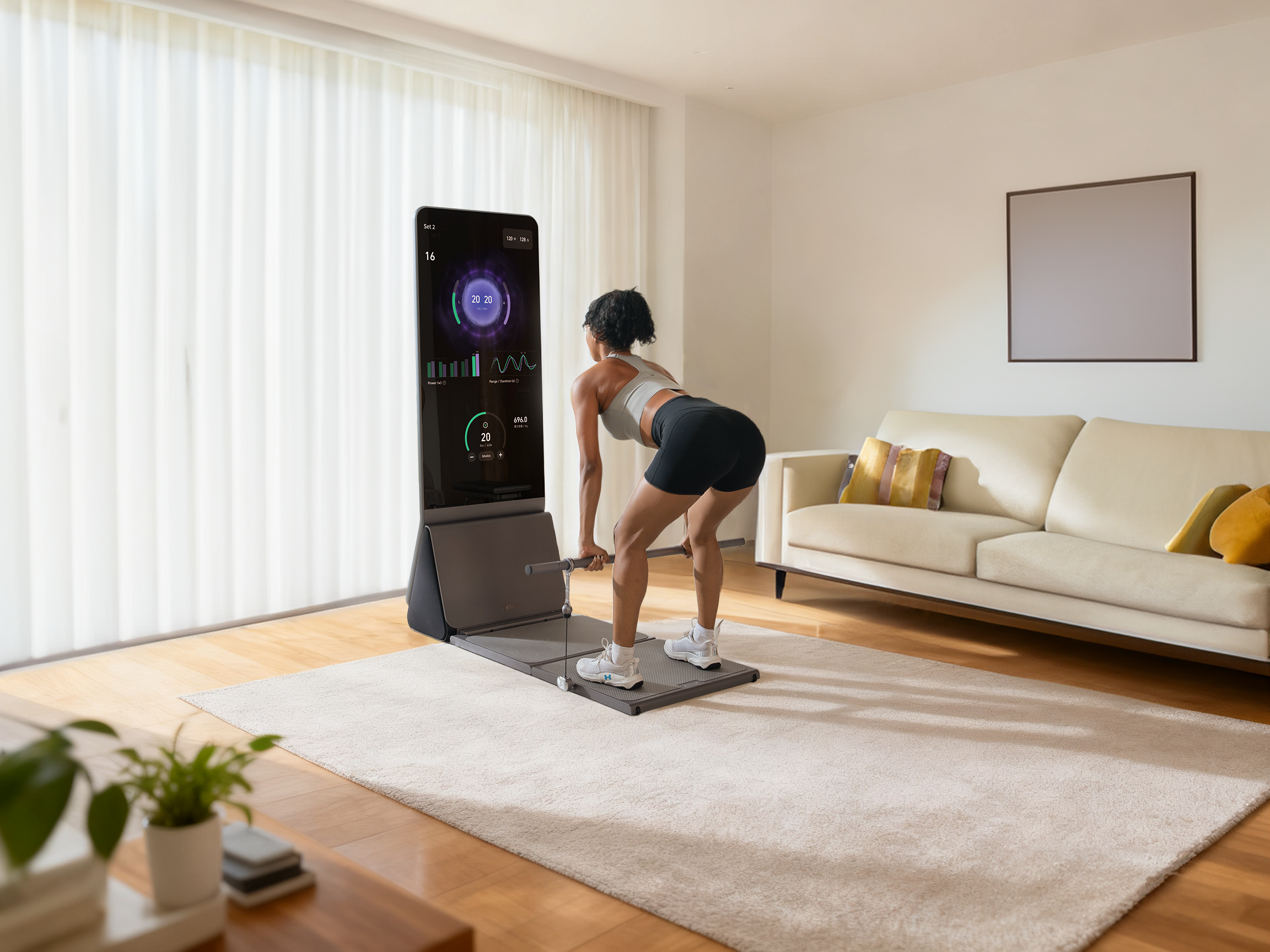 Woman using a compact home gym machine for a bent-over barbell exercise in a bright living room.
